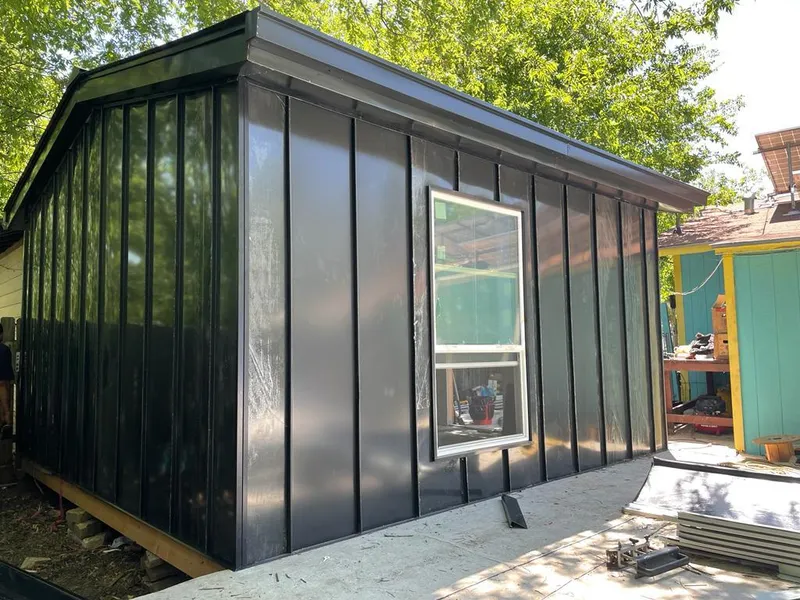 Black standing seam metal wall panels for Metal Roof Installation in Whitestown